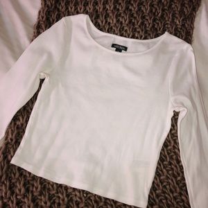white cropped long sleeve top